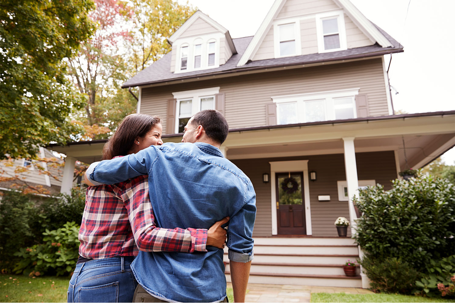 Loving-Couple-Walking-Towards-House